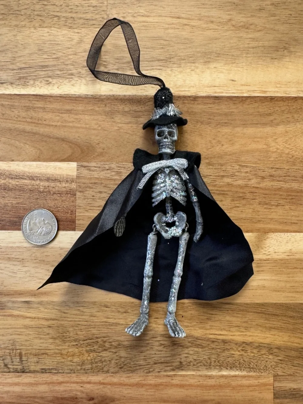 Glitter skeleton with cape and witch hat ornament - black - Joann's